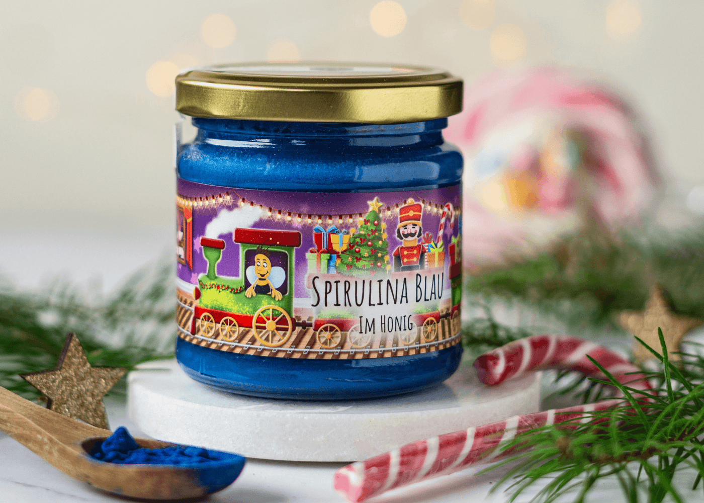 Weihnachtshonig Spirulina blau im Honig von Grega´s Imkerei